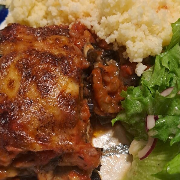 Classic parmigiana with couscous and salad