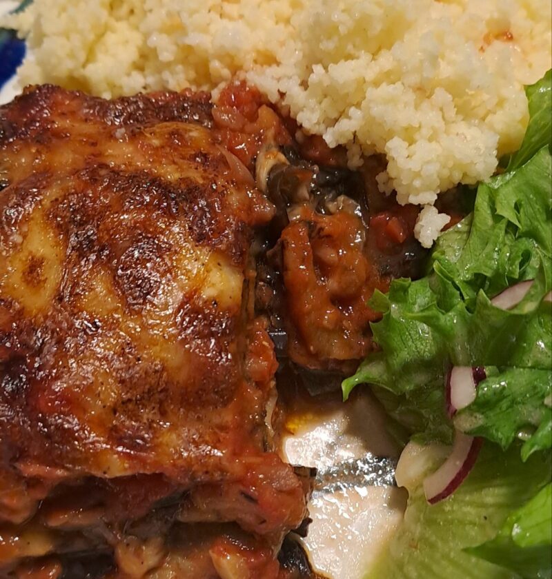 Classic parmigiana with couscous and salad