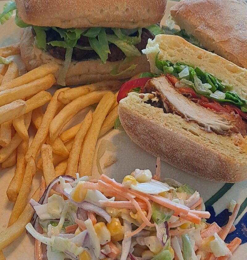 Spicy chicken burger, chips and coleslaw